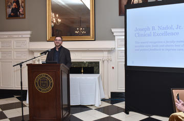 Dr. Polley Presenting Award