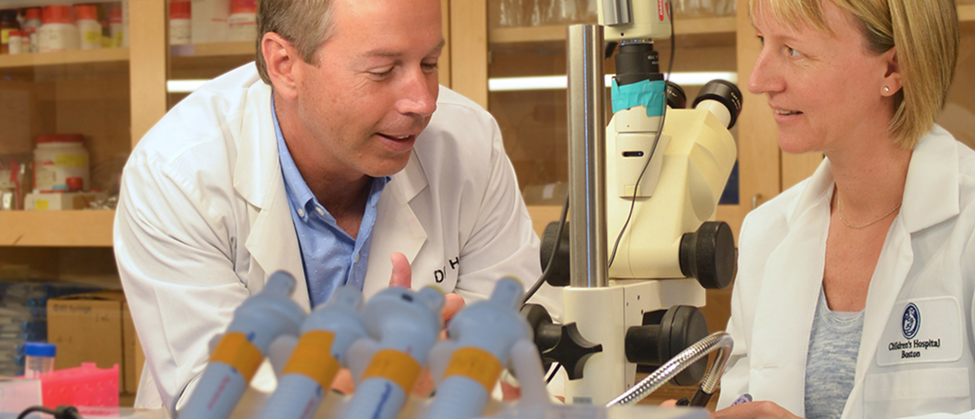 Drs. Jeff Holt and Gwen Geleoc in the their lab at Boston Children's Hospital