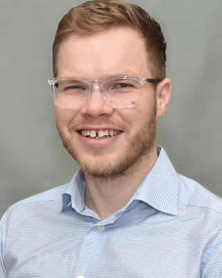Headshot of Dr. Clayton