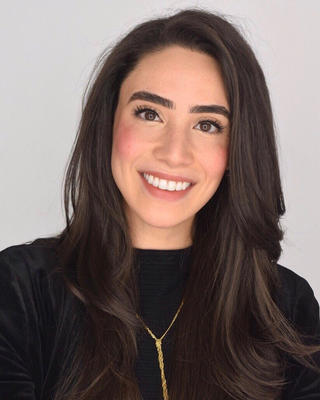 Justine Philteos, MD, Headshot