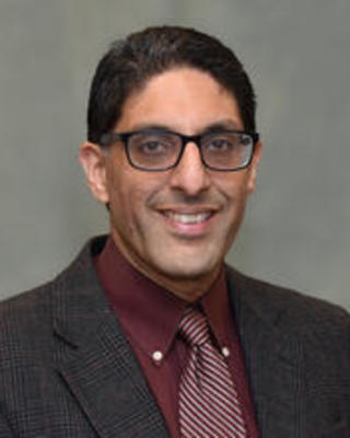 Dr. Faisal Karmali
