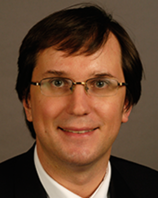 Dr. Adrian Priesol portrait